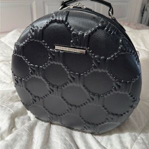 Steve Madden Cavalier Black Textured Round Cosmetic Bag